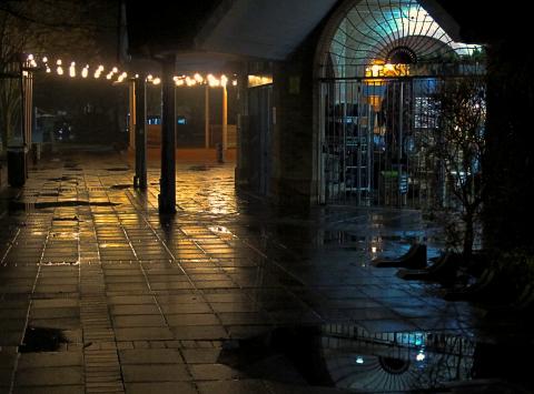 Photo of paved area at night