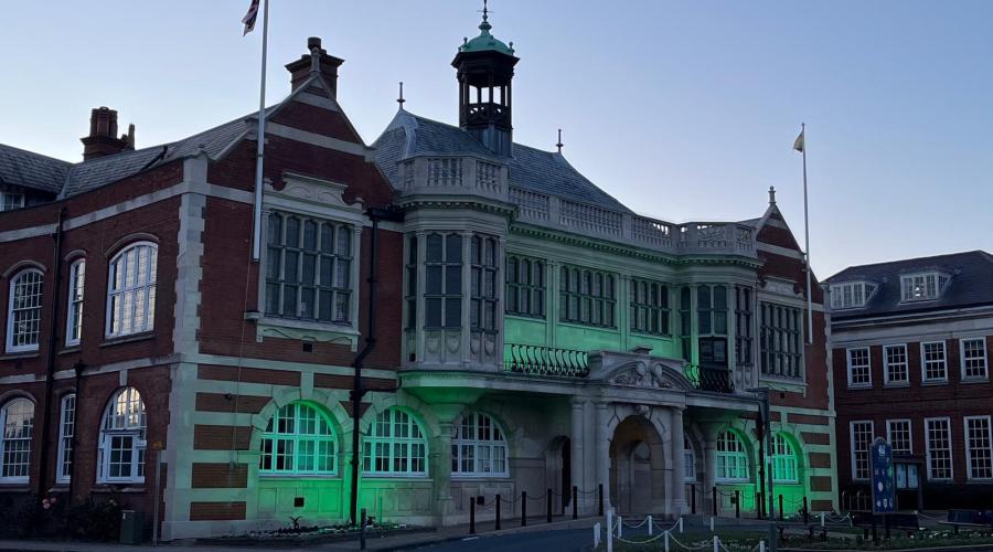 Hendon Town Hall lit up green for Grenfell