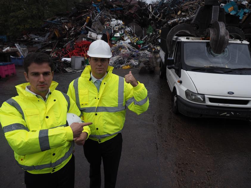 Before: Councillor Roberto Weeden-Sanz (left), Chair of the Safer Communities Partnership Board, and Leader of Barnet Council, Councillor Dan Thomas, at the truck crushing
