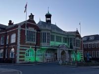 Hendon Town Hall lit up green for Grenfell